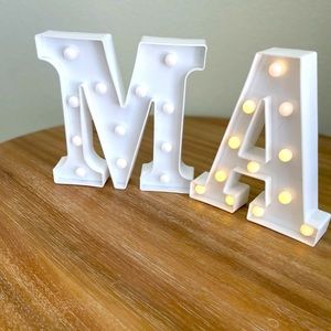 Plastic light up “M” and “A” letters